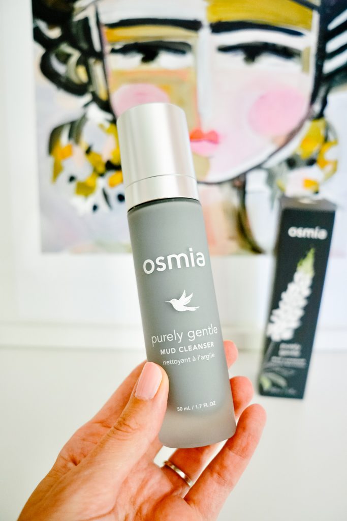 Holding up Osmia's newest cleanser